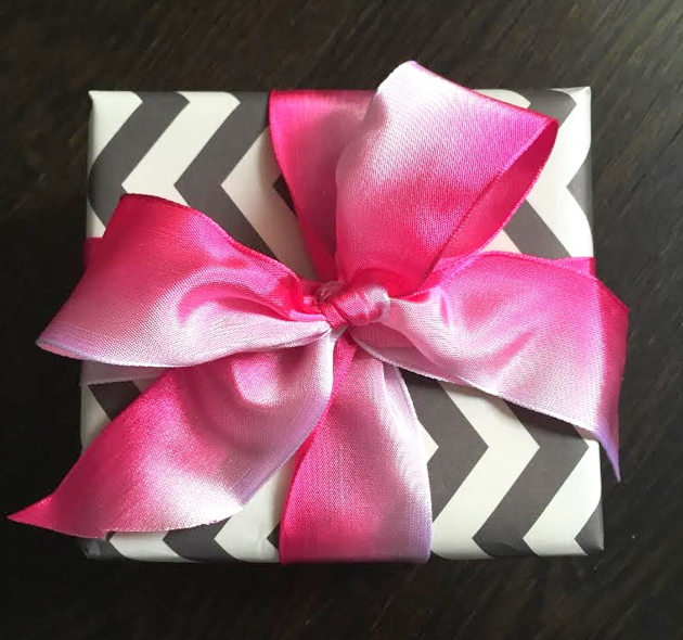 Gift tied with pink ombre bow