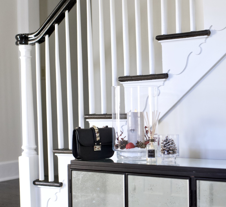 Foyer entry with Valentino Rockstud Bag, Aria Divina Diffuser from Casanera, Crate and Barrel Home Decor