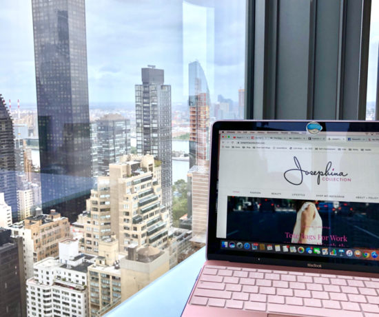 Home and Office Faves to Buy Now Post, Working on a laptop with a penthouse view of NYC
